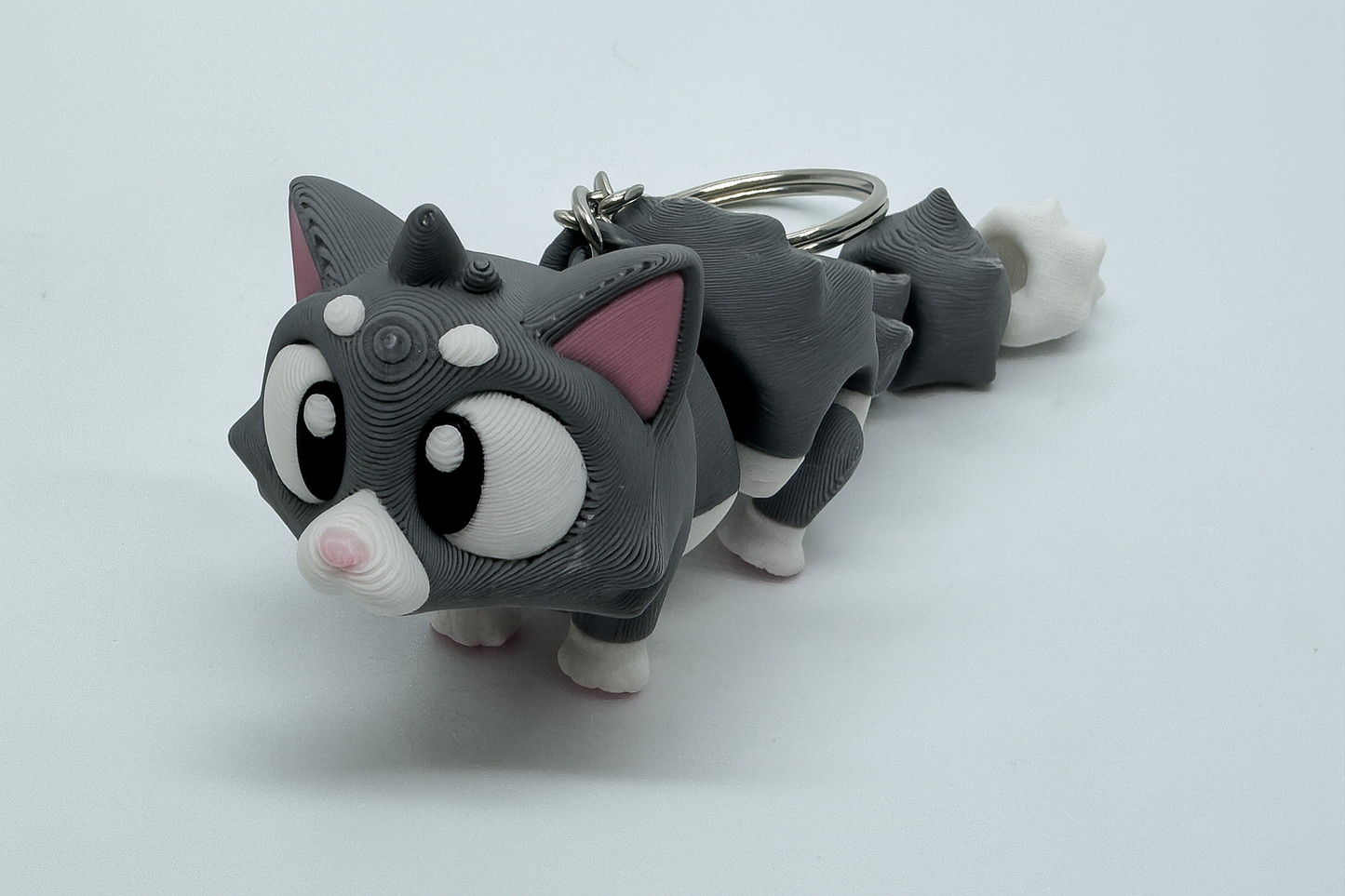 Articulated Gray Cat Keychain – Flexible Fidget Kitten