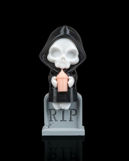 Grim Reaper Figurine – Cute Skeleton Drinking Milkshake – Spooky Gothic Desk Buddy – Funny RIP Tombstone Collectible – Halloween Shelf Decor