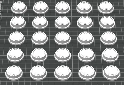 Pattern of white circular objects on a grid background