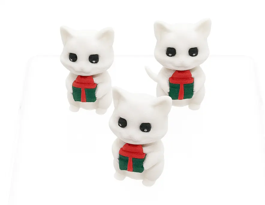 Three white cat-shaped plush toys with red and green wrapped presents on a white background