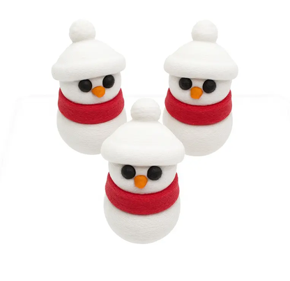 Three small snowman figurines with red scarves and carrot noses on a white background